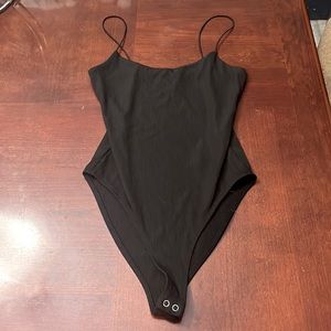 Forever 21 body suit. All black. Snap buttons. Size M!